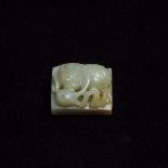 A Celadon Jade 'Mythical Beast' Seal, 青玉雕瑞兽方印, 1.1 x 1.2 x 1.6 in — 2.7 x 3.1 x 4.1 cm