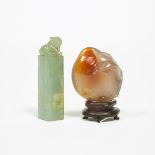 An Agate Carving of a Peach, together with Jadeite 'Mythical Beast' Seal, Qing Dynasty, 清 琥珀雕寿桃 翡翠瑞兽