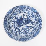 A Large Blue and White Lobed Charger, Early Kangxi Period, 康熙早期 青花花鸟纹大盘, diameter 14.8 in — 37.5 cm