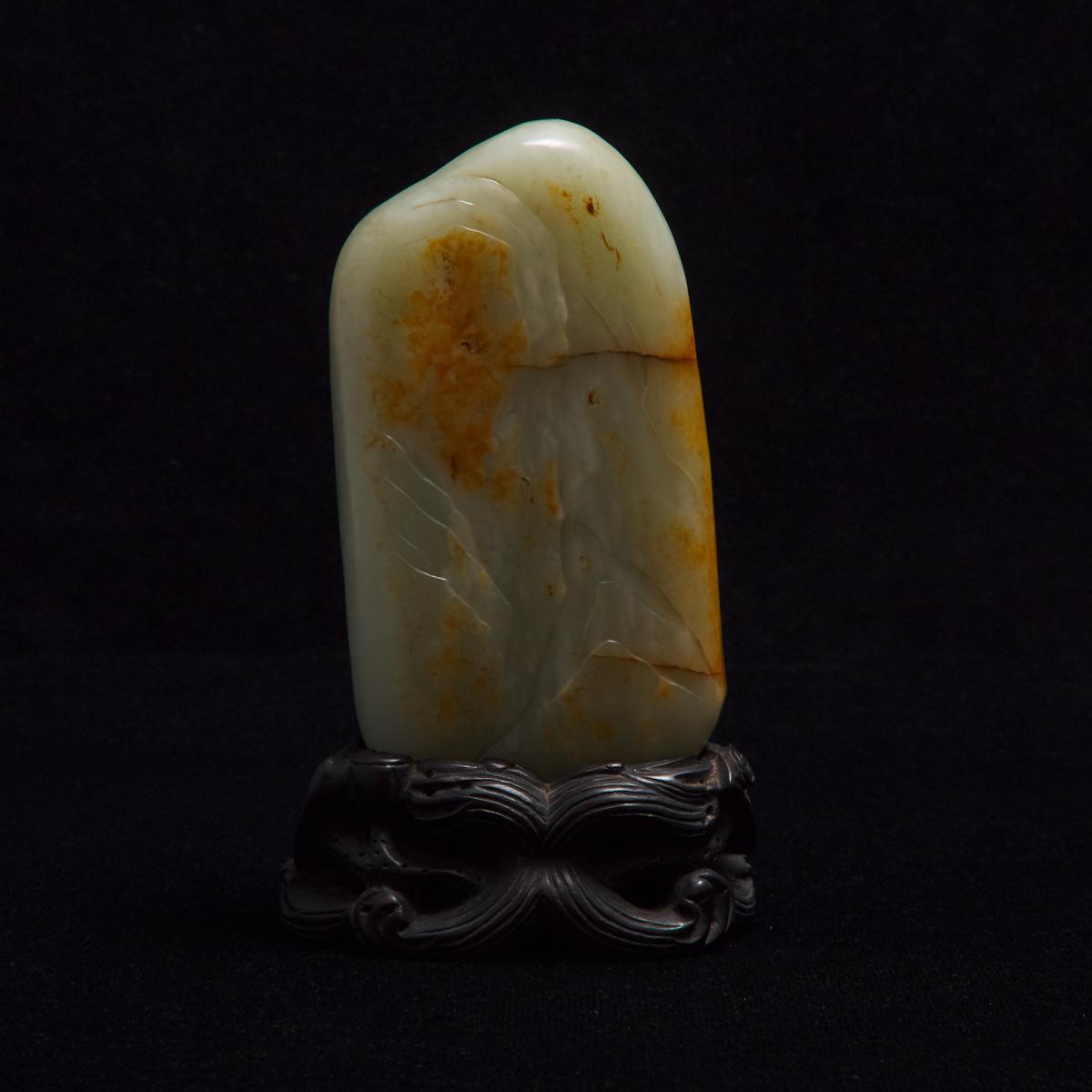 A Pale Celadon and Russet Jade 'Scholar and Boy' Boulder, 青白玉雕'高仕童子'山子, height 4.7 in — 12 cm - Image 2 of 2