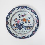 A Rare Octagonal Blue and White Pink-Enameled 'Flower Garden' Plate, Yongzheng/Qianlong Period, 18th