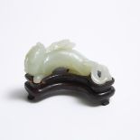 A Pale Celadon Carving of a Mythical Beast with Lingzhi, Qing Dynasty, 清 青白玉雕螭龙衔灵芝摆件, length 2.8 in
