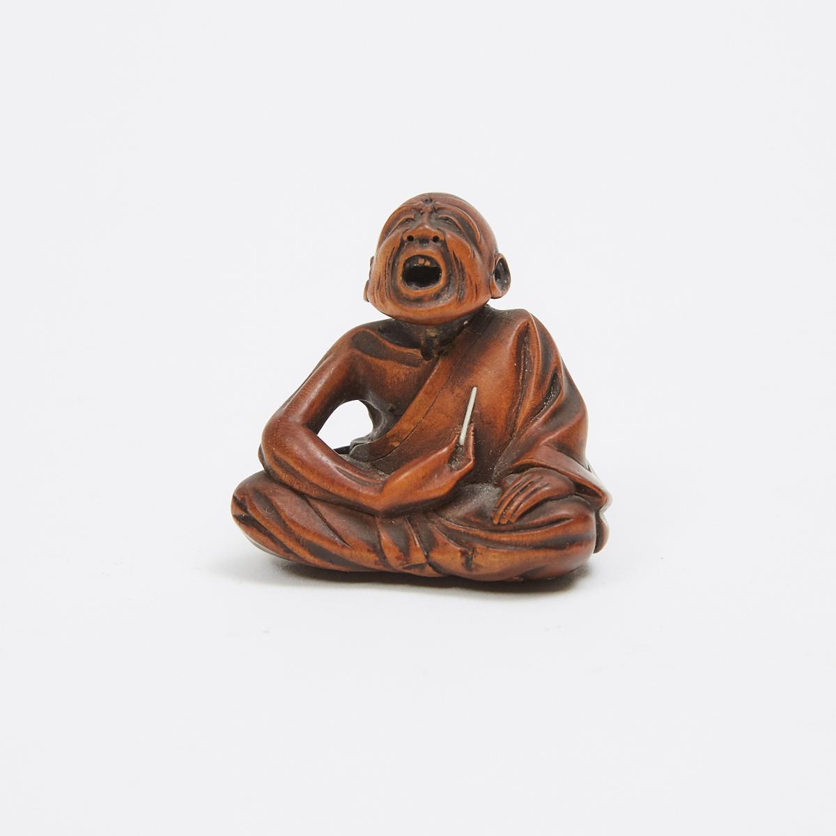 A Boxwood Netsuke of a Professional Sneezer, Signed Gyokkei, Mid-19th Century, 1.5 x 1.5 in — 3.8 x
