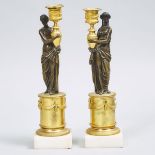 Pair of French Empire Style Gilt and Patinated Bronze Figural Candlesticks, eary 20th century, heigh