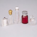 Five Silver and Metal Mounted Cut Glass Perfume Bottles, late 19th/early 20th century, largest heigh