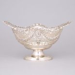 English Silver Pierced Oval Footed Basket, S. Blanckensee & Son, Birmingham, 1922, length 10.6 in —