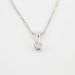 14k White Gold Pendant, bezel set with a brilliant cut diamond (0.68ct.) and suspended on a 14k whit