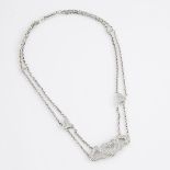18k White Gold Necklace, formed of double chains supporting a triple heart central panel and set wit