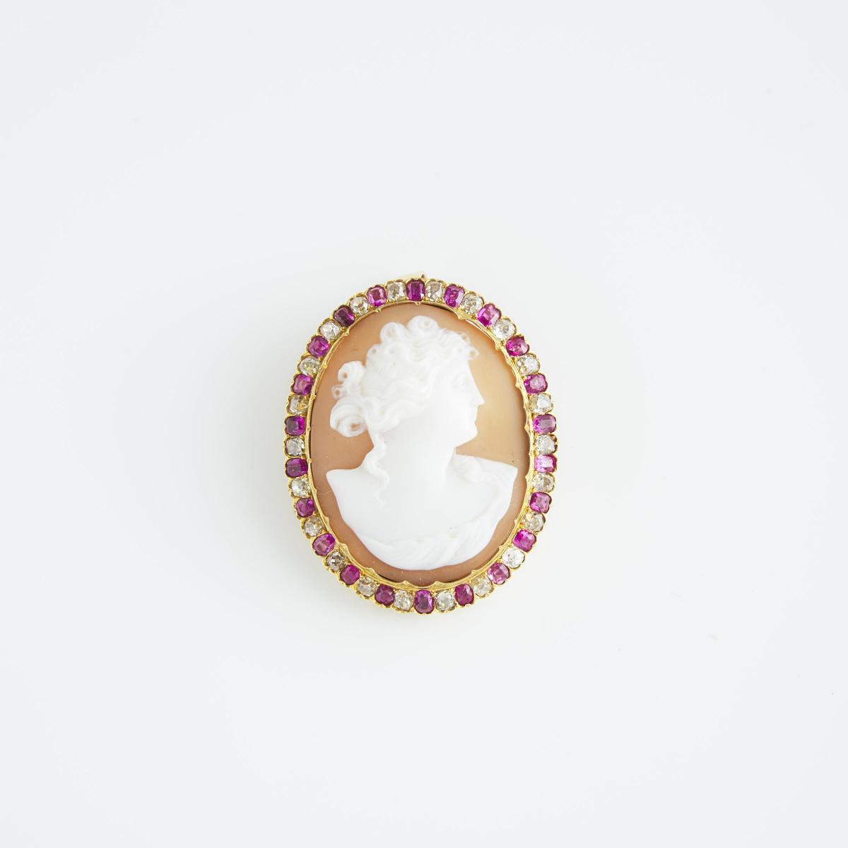 Oval Carved Shell Cameo, depicting the profile of a classical maiden, within an 18k yellow gold broo