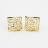 Pair Of Israeli 14k Yellow Gold Filigree Cufflinks, each set with a brilliant cut diamond (approx. 0