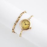 Lady's Swiss Wristwatch, 26mm; 15 jewel movement; in a 14k case with a 14k yellow gold expansion st