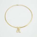 14k Yellow Gold Collar Necklace, with a 14k yellow gold pendant tension set with a brilliant cut dia