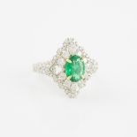 18k White Gold Ring, set with an oval cut emerald (1.48ct.) surrounded by 4 pear cut and 80 brillian