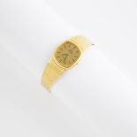 Lady's Omega Wristwatch, quartz cal.1837 3 jewel movement; in an 18k yellow gold case with an integr