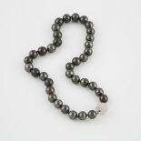 Single Strand Black Pearl Necklace, (10.5mm to 13.0mm) completed by an 18k white gold clasp