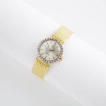 Lady's Omega De Ville Wristwatch, 25mm; 17 jewel cal.620 movement adjusted to 2 positions; in an 18k