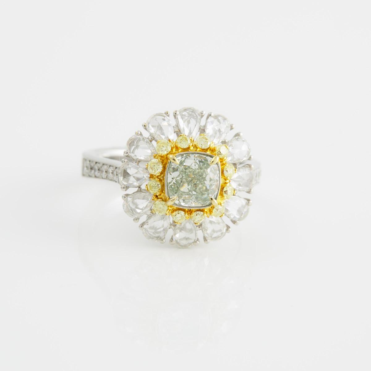 18k White And Yellow Gold Filigree Ring, set with a cushion cut green diamond (1.02ct.) encircled by
