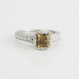 14k White Gold Filigree Ring, set with a cushion cut yellow diamond (1.04ct.) and decorated with 48