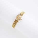 Lady's Geneva Wristwatch, 17 jewel movement; in a 14k yellow gold case set with a small marquise cut
