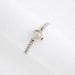 Lady's Omega Wristwatch, case #02893; 17 jewel ca.463 movement; in a 14k white gold case and strap s