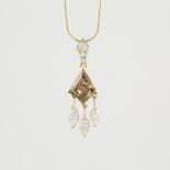 18k Yellow Gold Pendant, set with a kite cut brown diamond (approx. 3.00ct.) and 6 marquise and bril