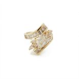 14k Yellow Gold Ring, set with a marquise cut diamond (approx. 0.75ct.) in a mount decorated with 6