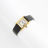 Lady's Cartier Tank Wristwatch, #104660; 17 jewel movement; 20mm; in a gold-plated case with a leath