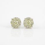 Pair of 14k White Gold Stud Earrings, each earring set with 10 brilliant cut diamonds (approx. 0.75c