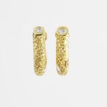 Pair Of Beni Sung 18k Yellow Gold Earrings, each earring set with a single cut and 2 full cut diamon