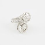 18k White Gold Cross-Over Ring, set with 38 baguette and 128 brilliant cut diamonds (4.25ct.t.w.)