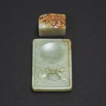 A Celadon Jade 'Peach' Inkstone, together with a White and Russet Jade Seal, 玉雕俏色螭龙钮章 玉雕寿桃纹小砚台一组两件,