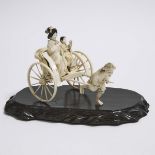 An Ivory Okimono of a Lady and Child in a Rickshaw, Meiji Period, length 8.3 in — 21.2 cm