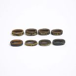 A Group of Eight Shakudo Nanako Fuchi, 19th Century, length 1.5 in — 3.9 cm (8 Pieces)