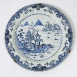 A Massive Blue and White 'Landscape' Charger, 18th Century, 十八世纪 青花山水纹大盘, diameter 22 in — 56 cm