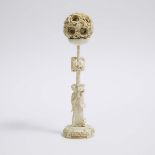 A Chinese Ivory Puzzle Ball and Stand, Early 20th Century, 二十世纪早期 牙雕鬼工球, height 12.6 in — 32 cm