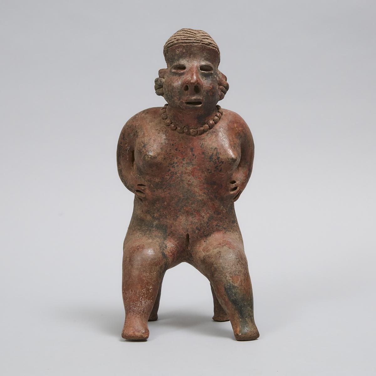 Nayarit Ixtlán del Río style Redware Pottery Figure, West Mexico, 100 B.C. - 200 A.D., height 13.2 i