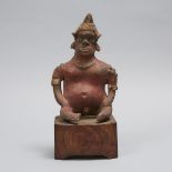 Jalisco Pottery Seated Male Figure, West Mexico, 100 B.C. - 200 A.D., overall height 14 in — 35.6 cm