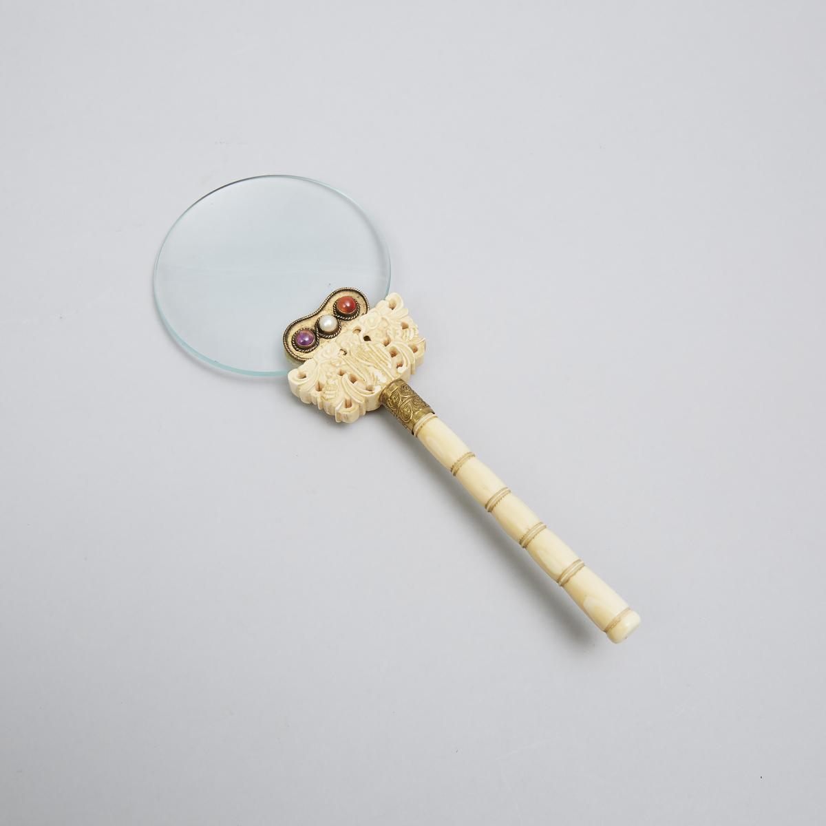 Chinese Turned and Carved Ivory Magnifying Glass, early 20th century, height 9 in — 22.9 cm - Image 2 of 2