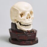 Japanese Carved Ivory Okimono Model of a Human Skull, early 20th century, height 4 in — 10.2 cm