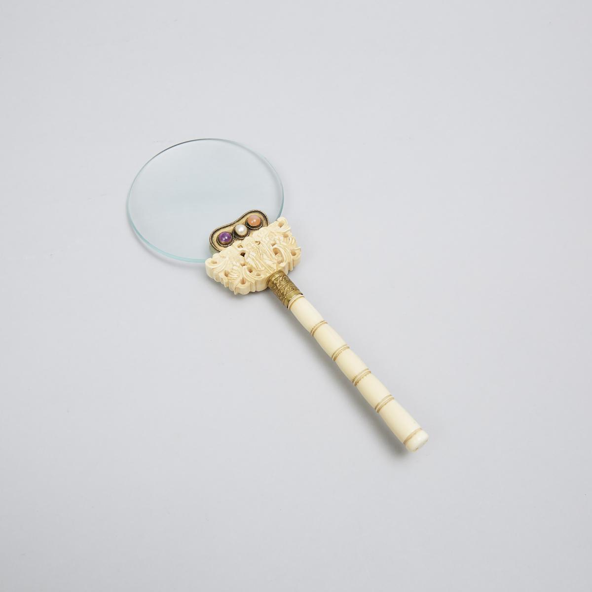 Chinese Turned and Carved Ivory Magnifying Glass, early 20th century, height 9 in — 22.9 cm