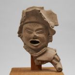 Veracruz Pottery Head and Shoulder Fragment of a Figure of Xipe Totec, South East Mexico, 500 - 900