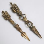 Two Indo-Tibetan Bronze Ceremonial Phurba Daggers, early 20th century, diameter 17.25 in — 43.8 cm