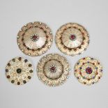 Five Turkmen Jewelled Silver Gilt Gulyakas, early 20th century, largest diameter 5 in — 12.7 cm (5 P