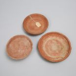 Three Roman Period North African Redware Pottery Dishes, 300 A.D., various sizes, largest diameter 7
