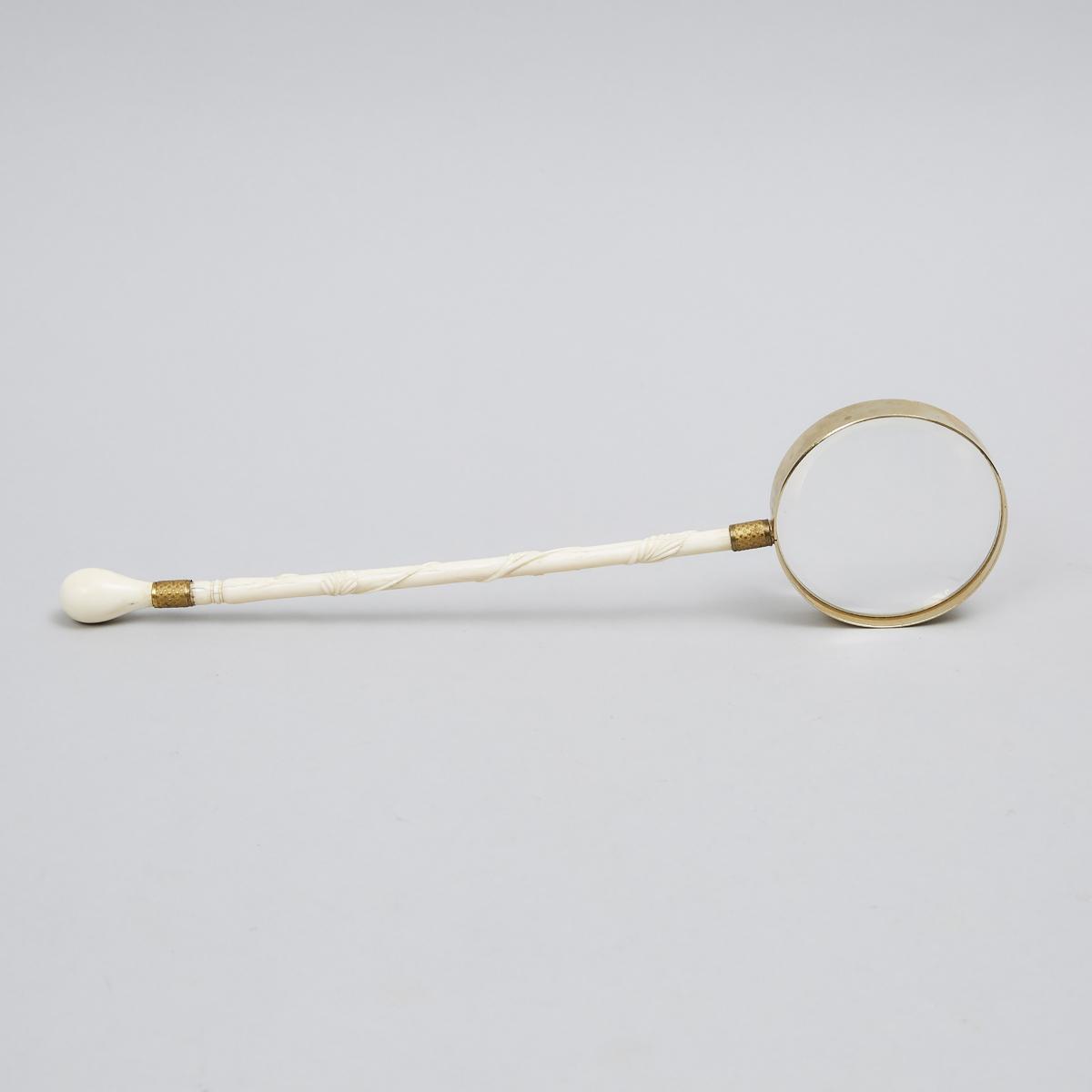 French Carved Ivory Parasol Handled Magnifying Glass, 19th century and later, length 12.5 in — 31.8