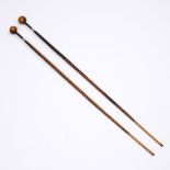 Pair of English Silver Mounted Lignum Vitae Walking Sticks, c.1902, tallest height 46.75 in — 118.7