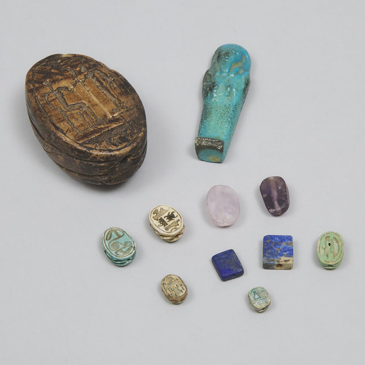 Group of Eight Egyptian Faience and Mineral Scarabs and an Ushabti, Third Intermediate Period and La - Image 2 of 2