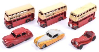 6 Dinky Toys. Austin Somerset Saloon (161) in red with red wheels. A Jaguar XK120 (157) in yellow