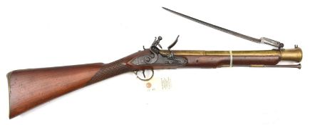 A brass barrelled flintlock blunderbuss with spring bayonet by Wallis (of Hull’), c 1785, 29½”