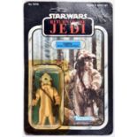 A Kenner Star Wars Return of the Jedi Logray (Ewok Medicine Man) vintage 3.75" figure. On a sealed